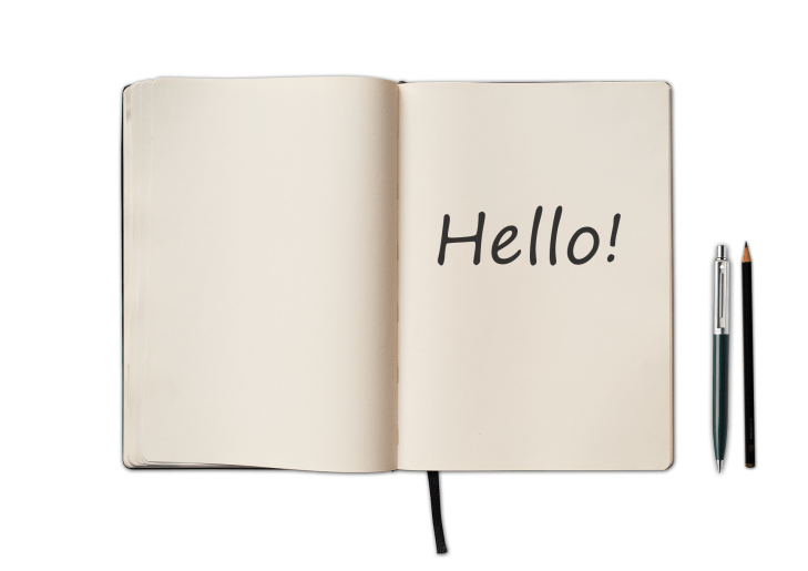 open notebook and pens with hello message